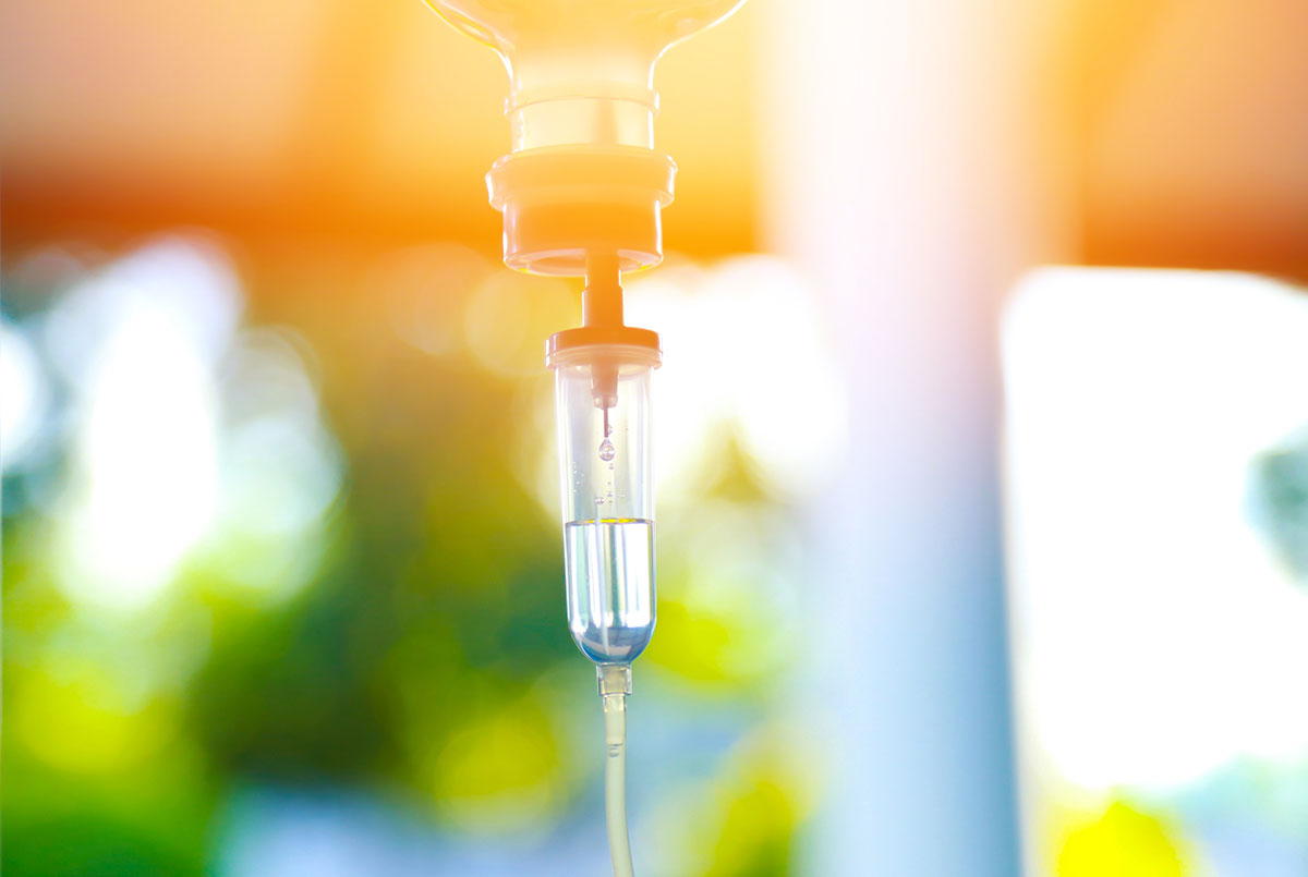 IV drip chamber and line in an NCFM treatment room